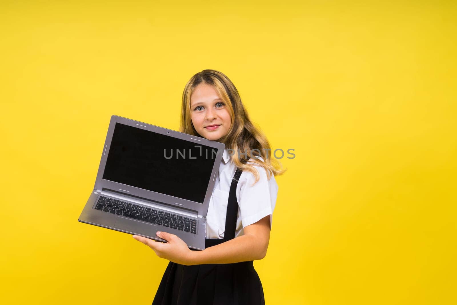 Funny little blonde kid girl 12-13 years old studio portrait. Childhood lifestyle conception