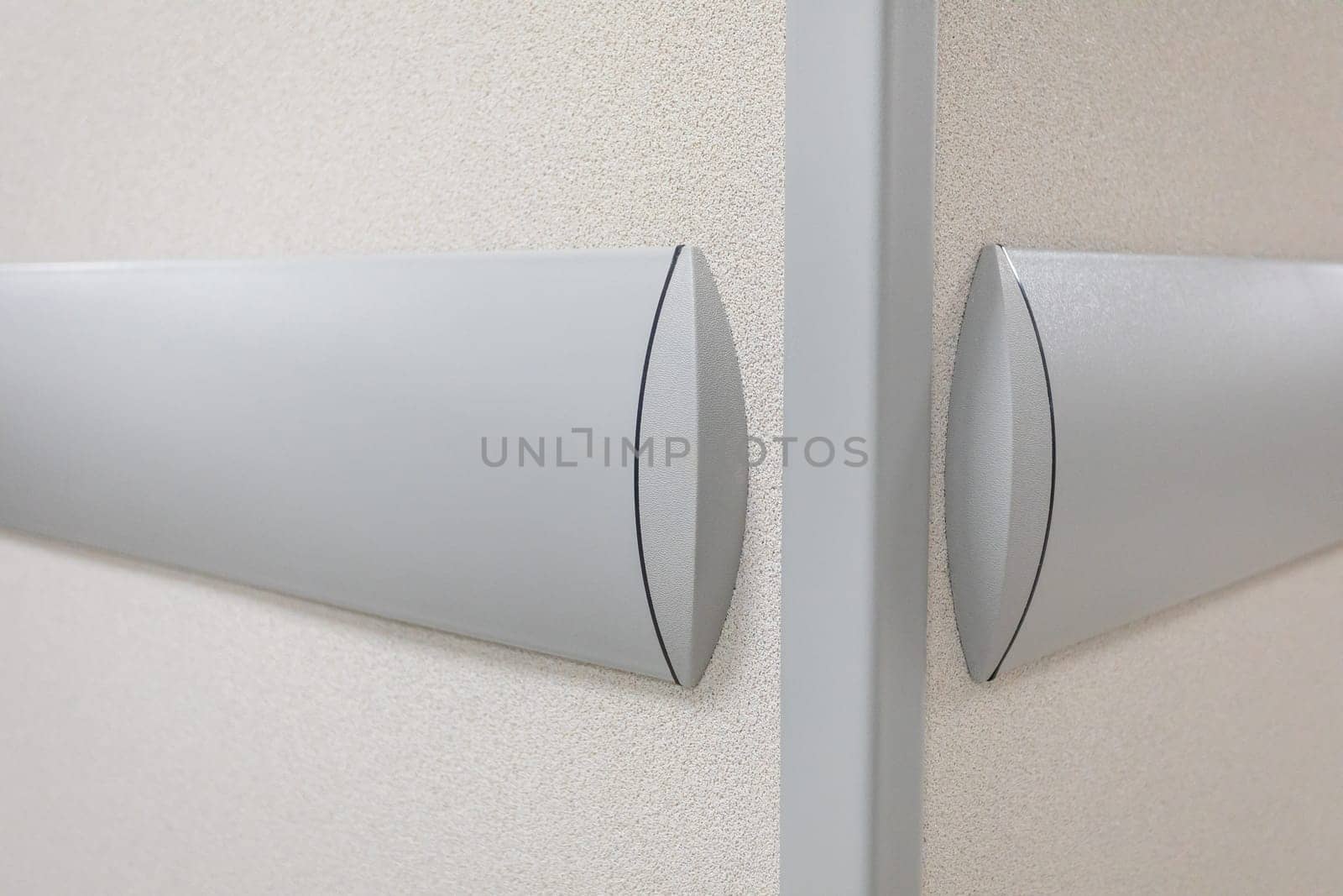 In the public building, bumpers are installed on the walls in all corridors. Protecting the walls from mechanical damage.