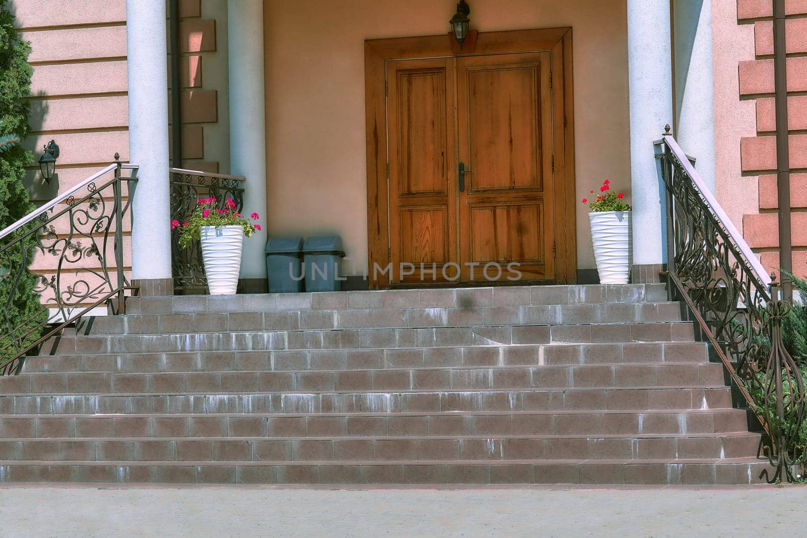 an opening, such as a door, passage, or gate, that allows access to a place