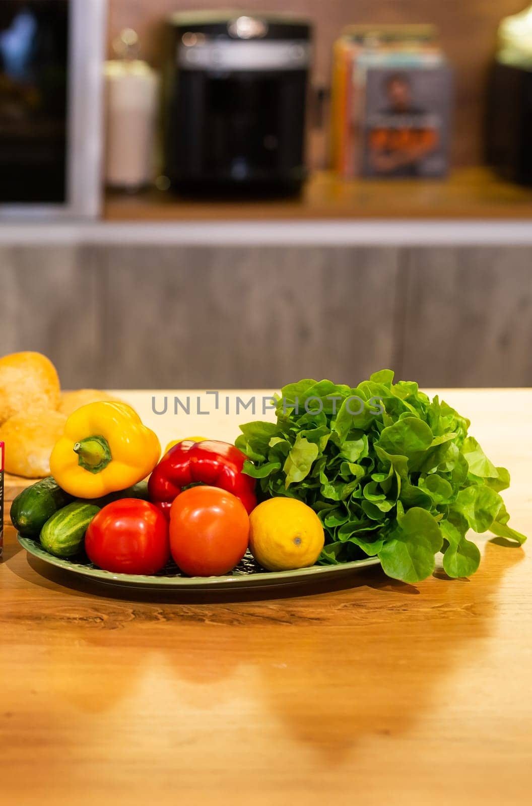 Still life of fresh organic vegetables on plate on kitchen - vegetarian and vegan