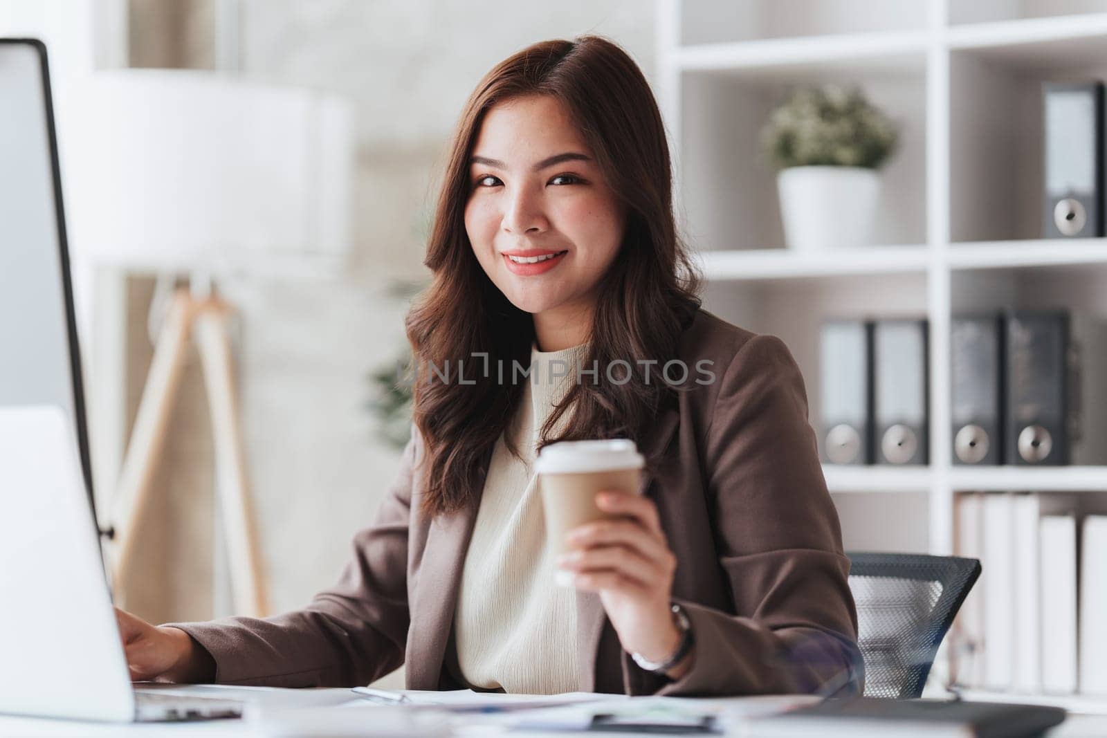 Accountant woman working on laptop and do document, tax, exchange, research, accounting and Financial advisor concept.