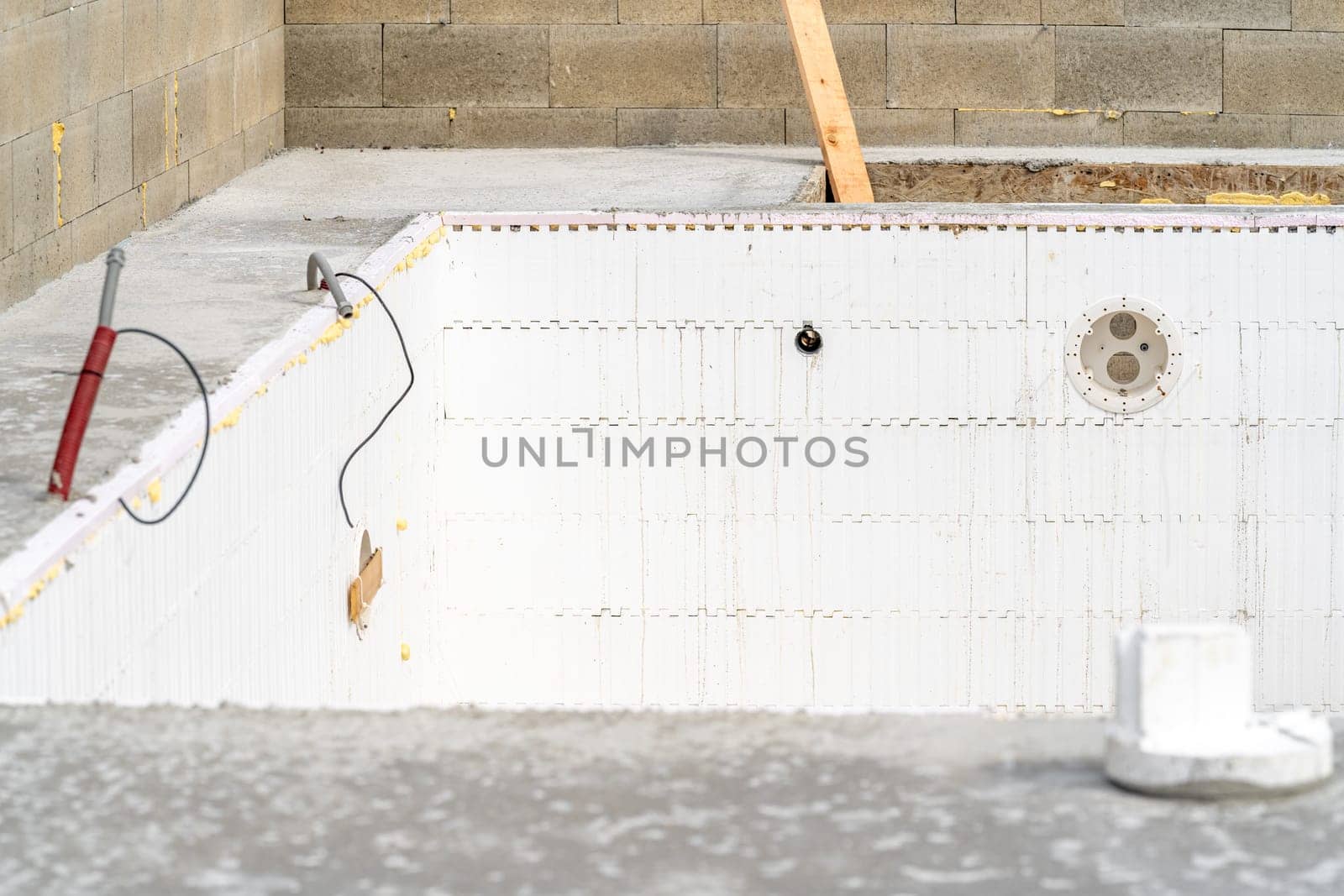 construction of a swimming pool at a family house. High quality photo