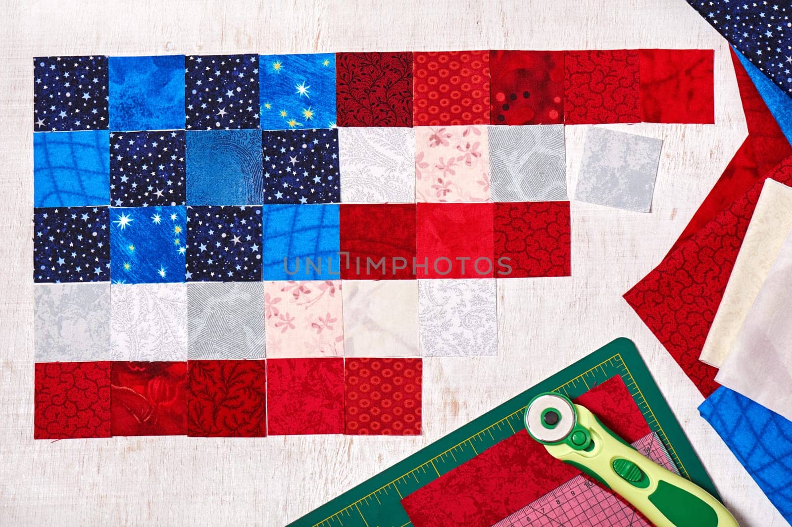 Square pieces of fabrics lying like a flag of USA