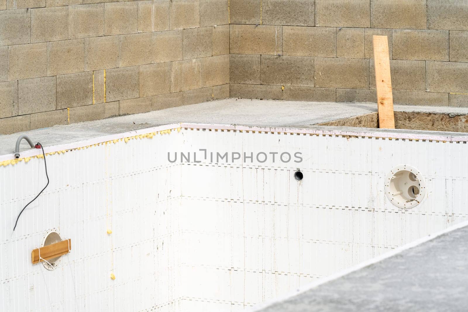 construction of a swimming pool at a family house. High quality photo