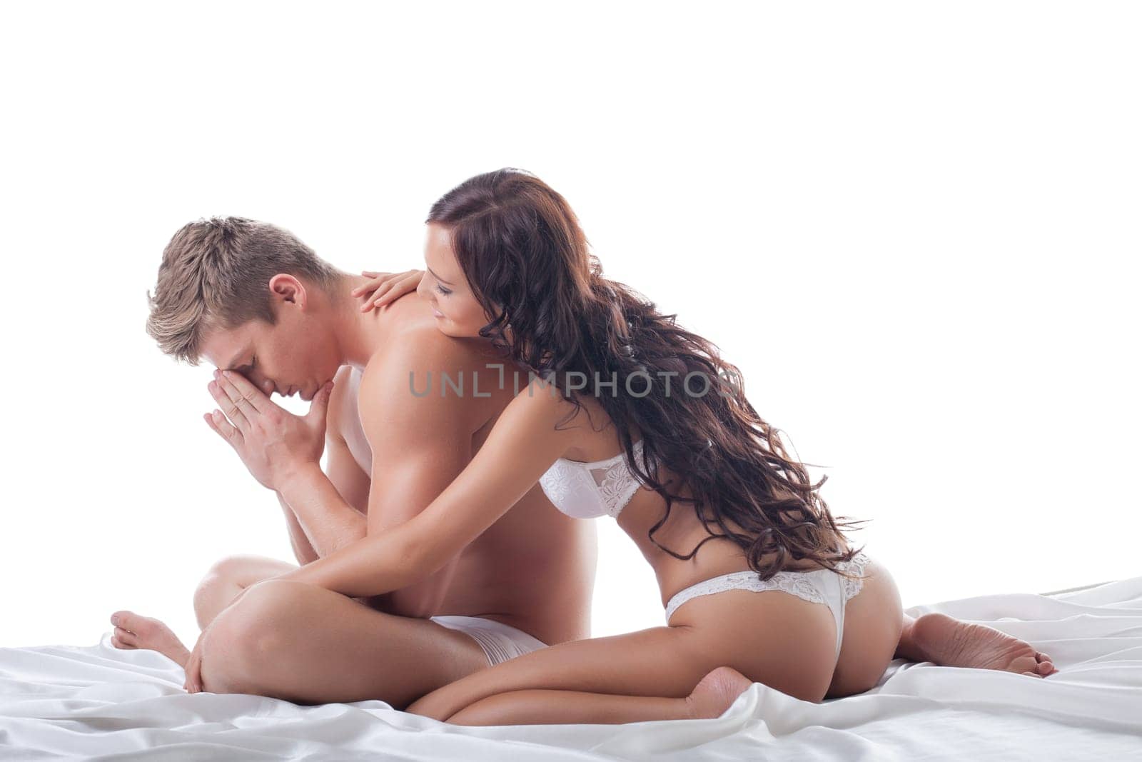 Concept of sexual problem - unhappy young couple in bed, close-up