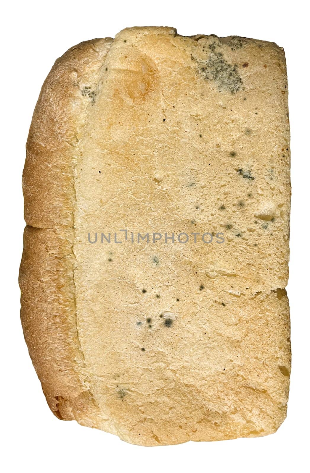 moldy loaf of white bread on a white background.