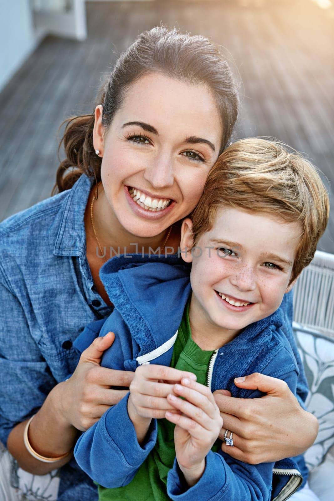 This little guy stole my heart. Portrait of a happy mother and her son outdoors