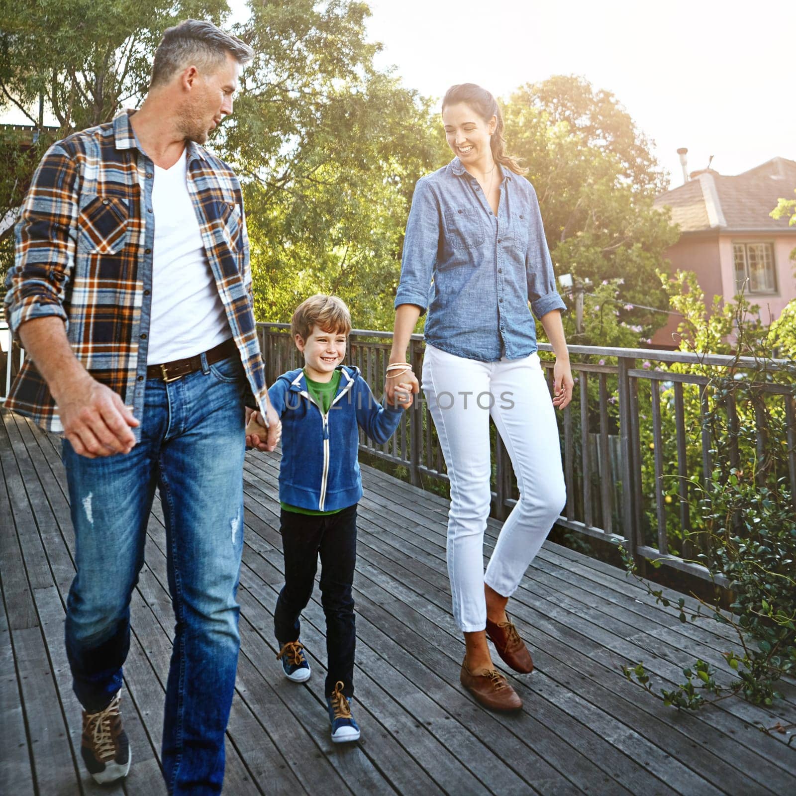 Unconditional family love. a happy family of three spending time together outdoors