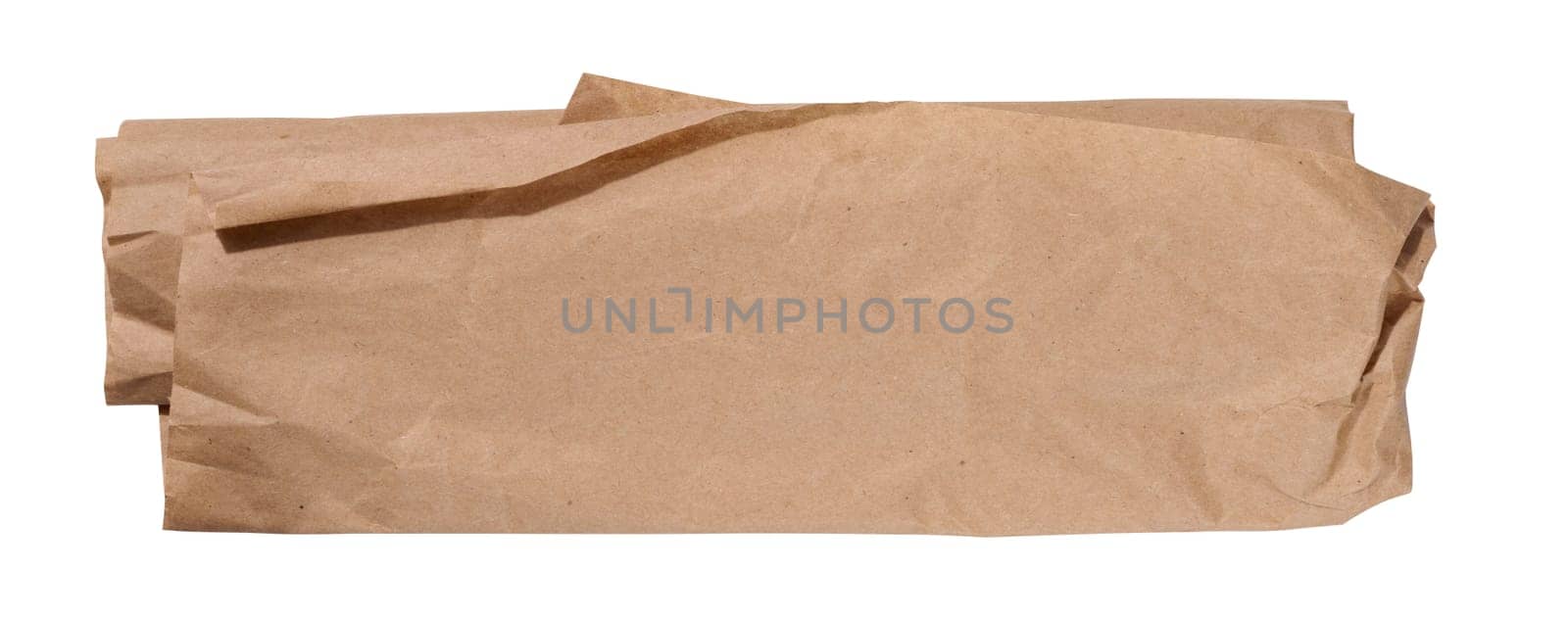 Piece of crumpled brown paper isolated on white background by ndanko
