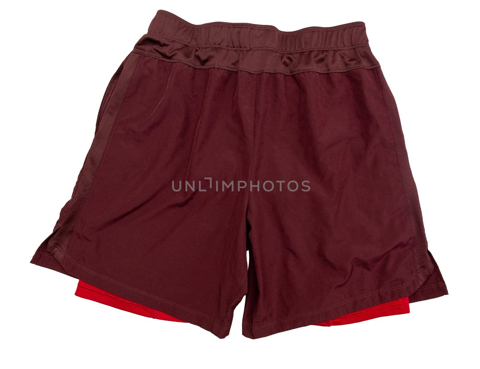 Red two-layer running shorts isolated on white background. by BY-_-BY