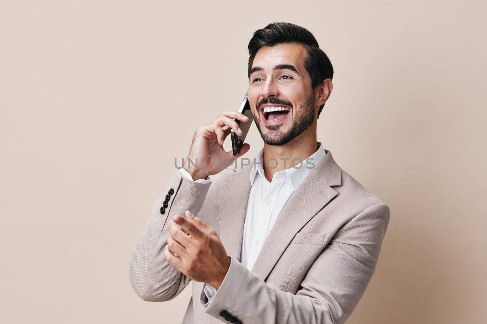 man cell adult young isolated smile person communication background studio suit businessman hold portrait internet blogger happy call phone business smartphone