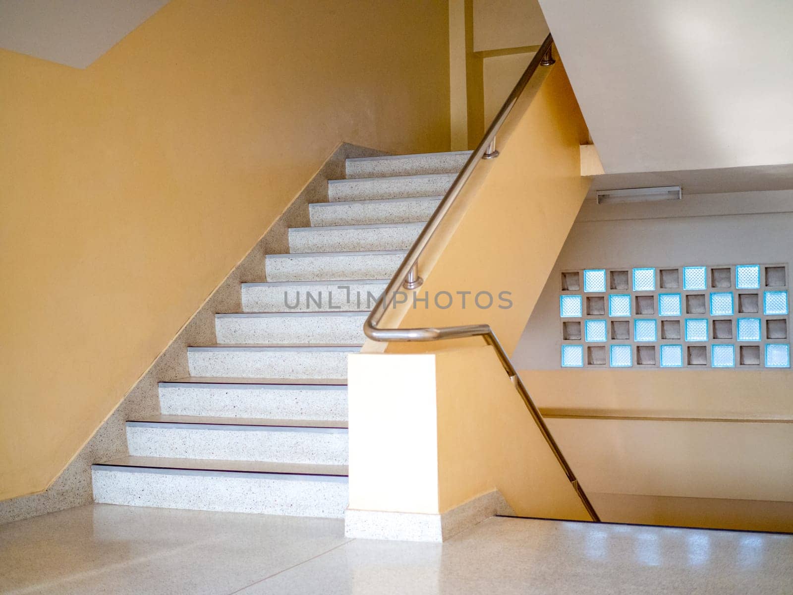 Stairways are concrete in multi-storey buildings and have steel handrails.