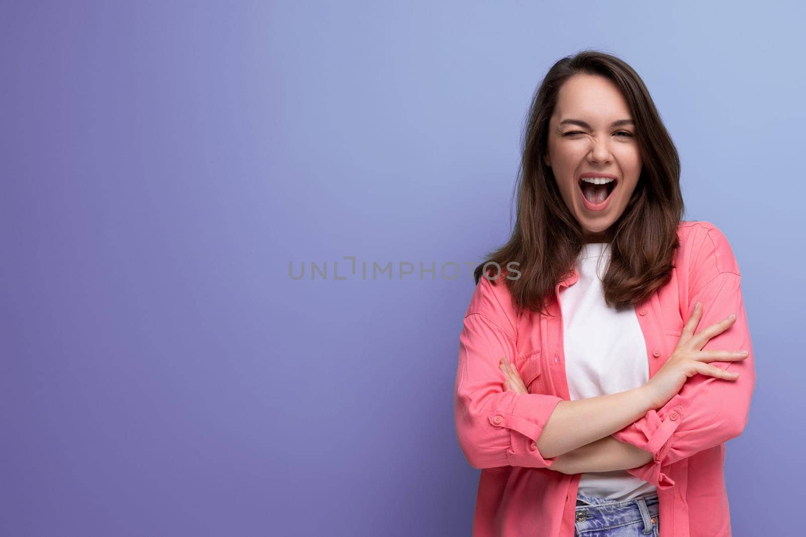 incredibly smiling happy young lady in a stylish summer look on a studio isolated background by TRMK