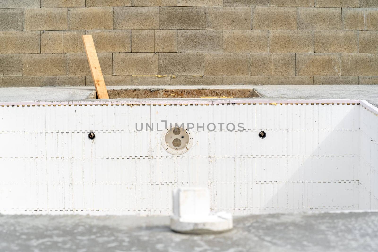 construction of a swimming pool at a family house. High quality photo