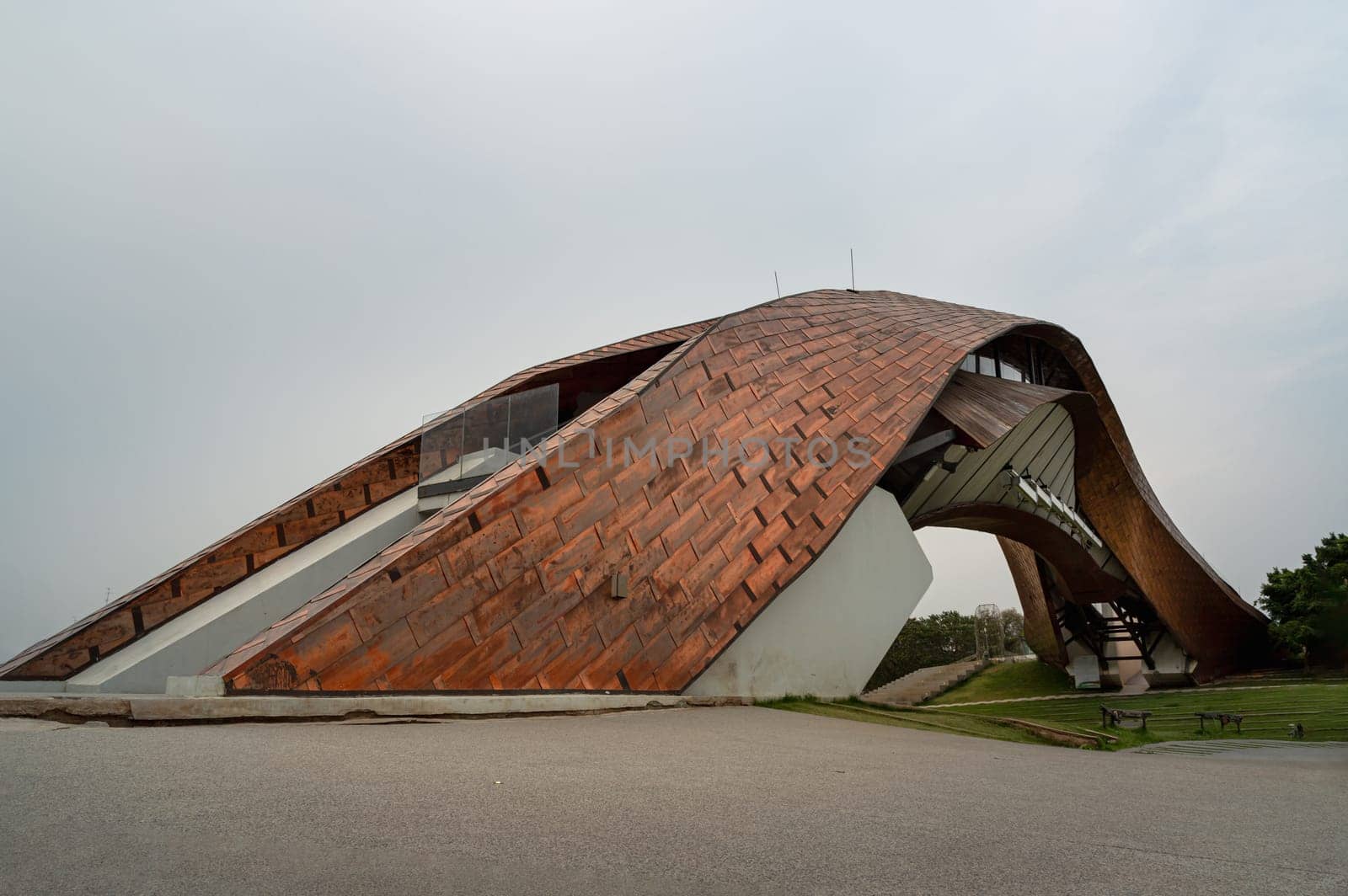Nakhonsawan, Thailand - Apr 23, 2023 - The Exterior Design Art Architecture name is PA SAN or Pasan Wooden Bridge, The memorial building landmark architecture for the origin of Chao Phraya River at Pak Nam Pho Located at the cape of Yom Island The confluence of the Ping and Nan rivers. Selective focus.