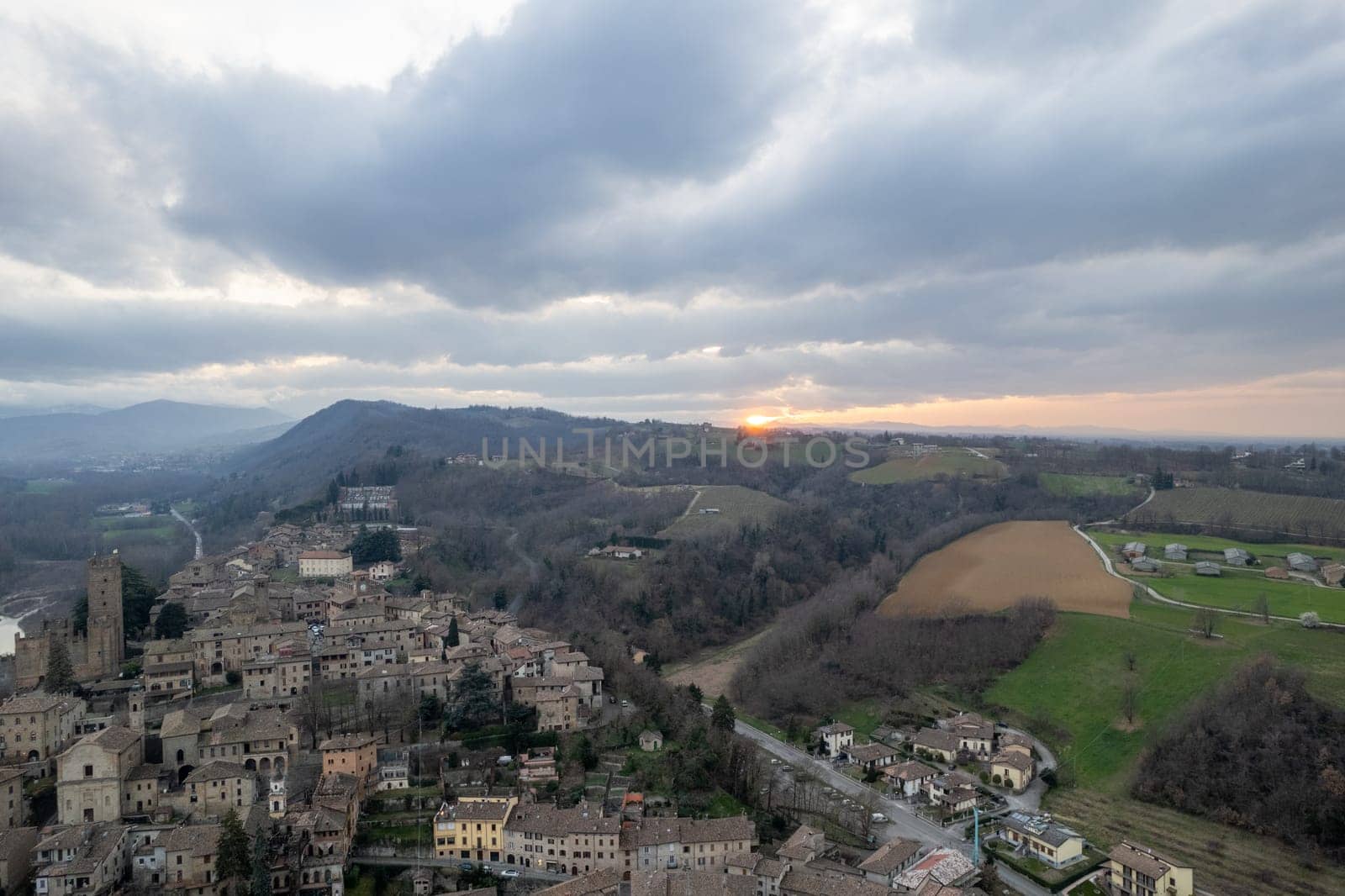 Aerial view of Castell'Arquato medieval village in Emilia Romagna, Italy at sunset