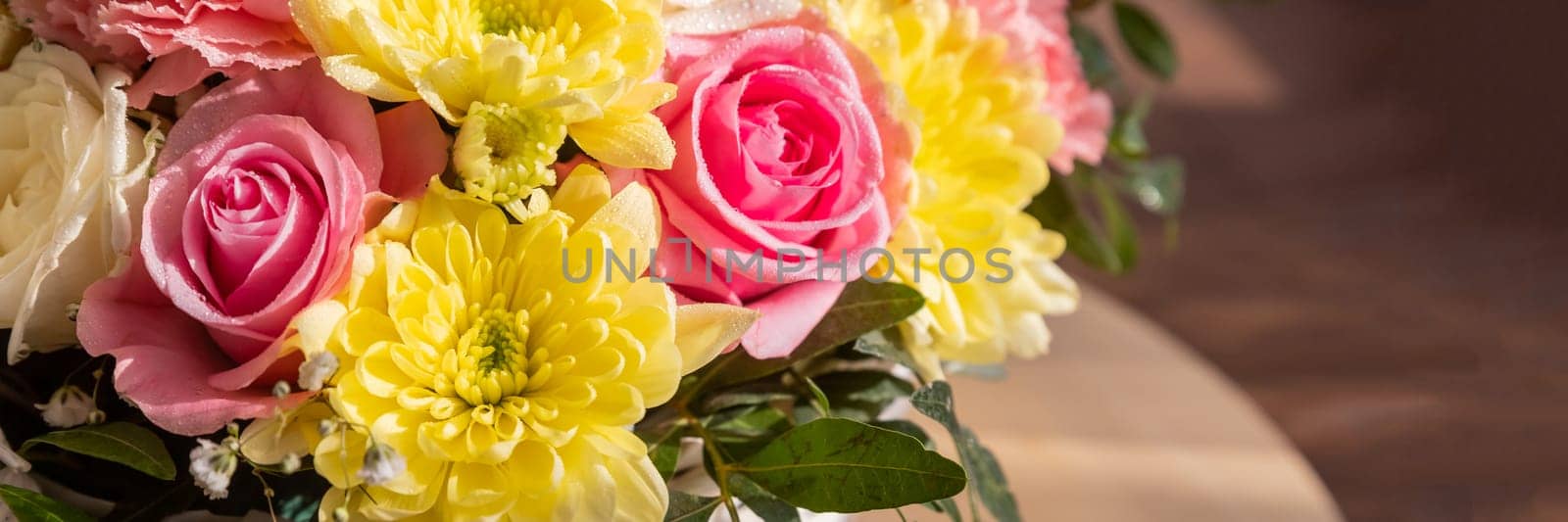 Beautiful summer banner for a website with a bouquet of bright flowers . Bouquet of pink roses, chrysanthemums and carnations.natural background for the designer.Congratulation or present concept by YuliaYaspe1979