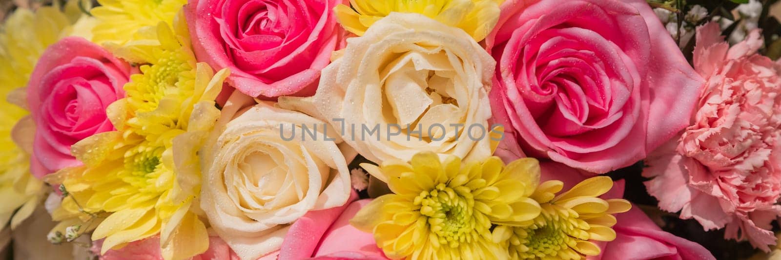 Beautiful summer banner for a website with a bouquet of bright flowers . Bouquet of pink roses, chrysanthemums and carnations.natural background for the designer.Congratulation or present concept by YuliaYaspe1979