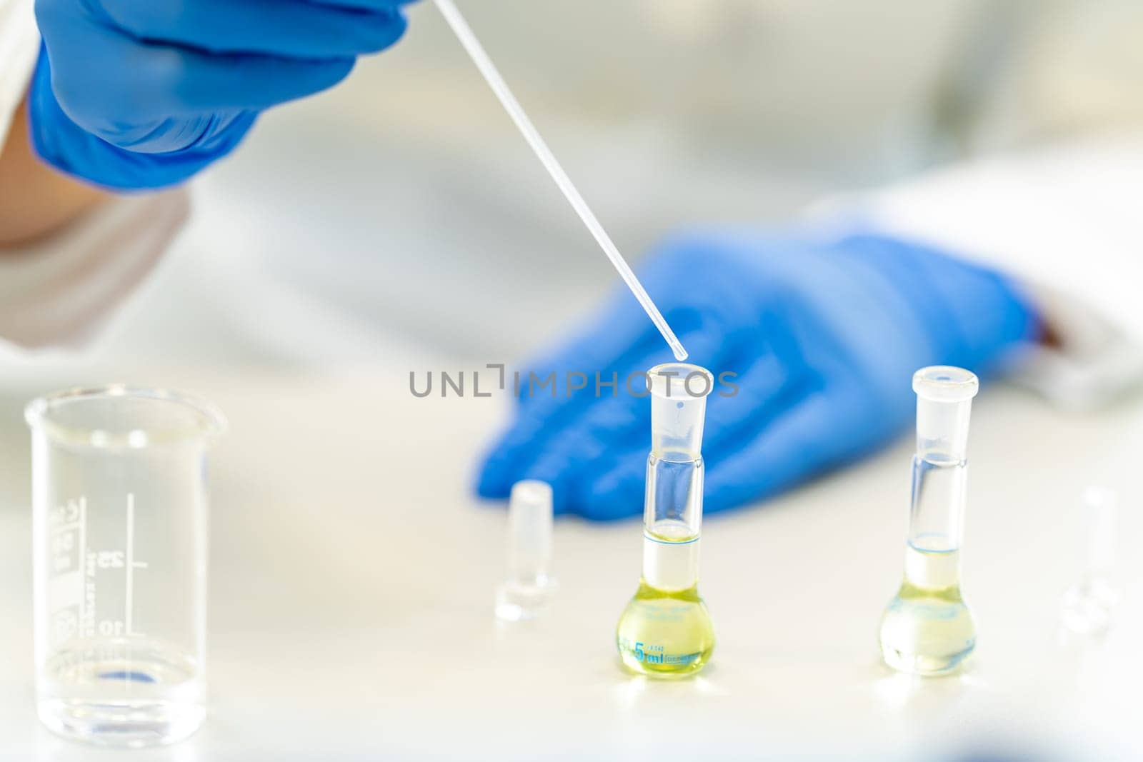 test of a chemical sample in the scientific laboratory of the research institute.