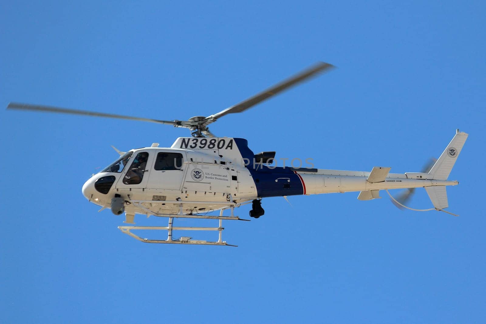 CBP Helicopter. Border Patrol Helicopter flies in the air patrolling the US Border with Mexico. El Paso, Texas, October 21, 2019.