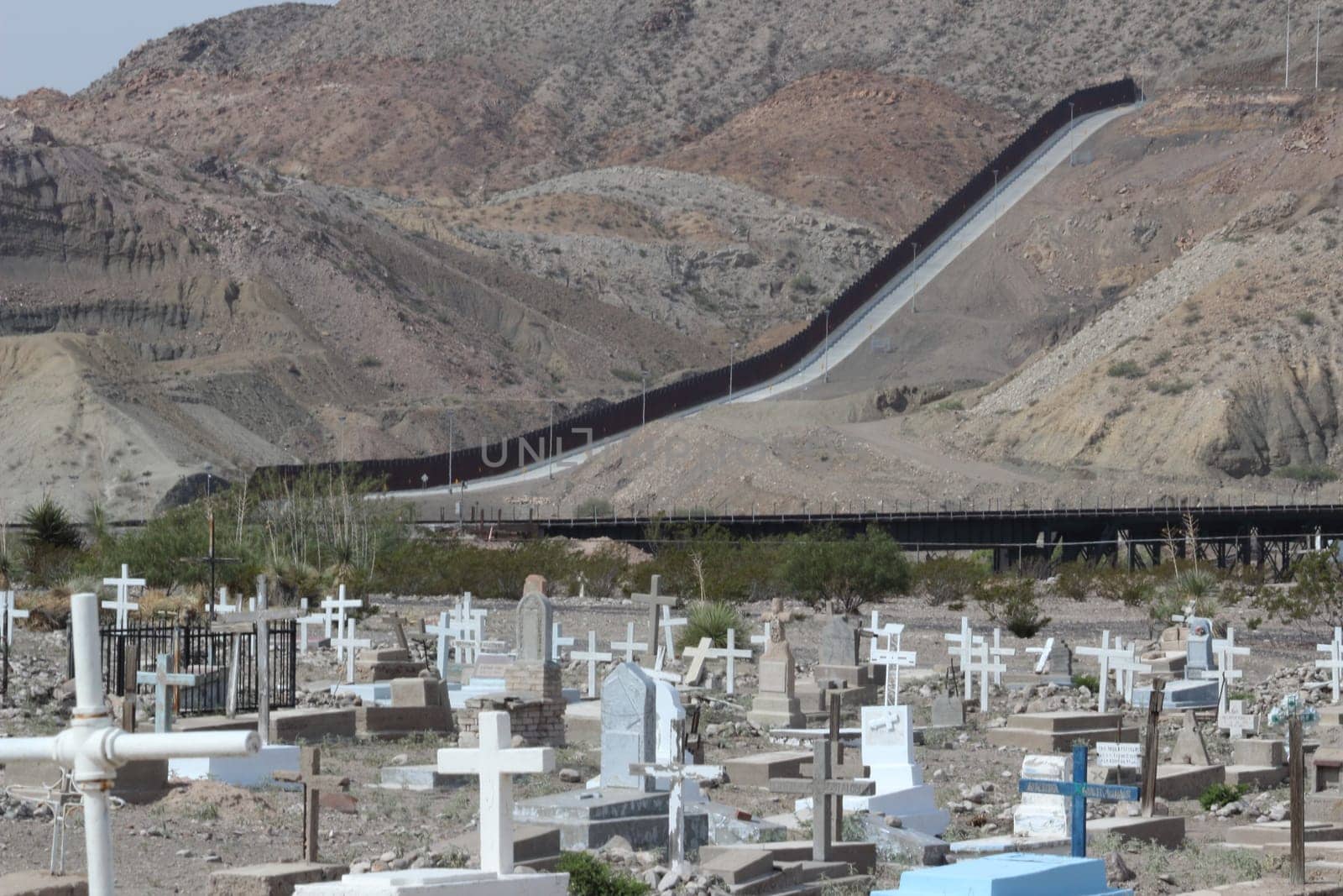 View at the Privately Funded Border Wall from the cemetery in El Paso. by Marcielito