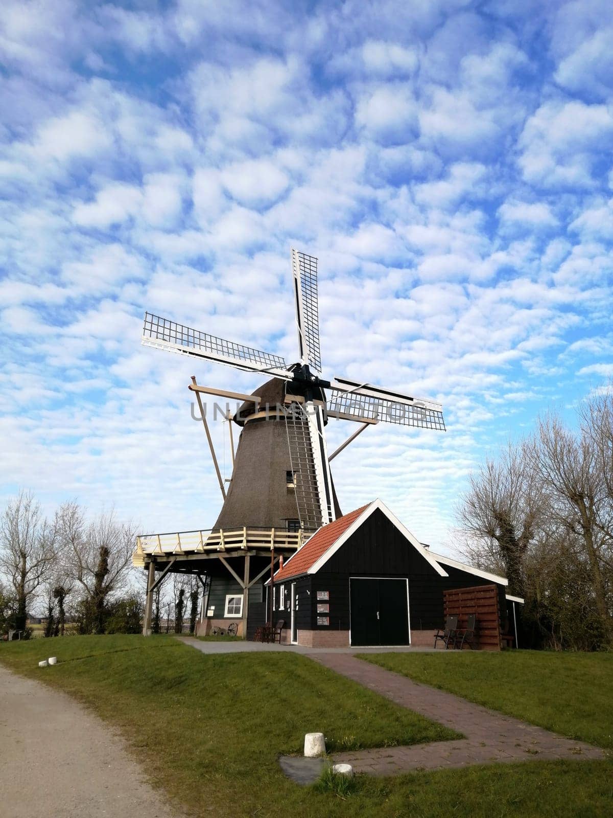 Dutch windmill with nice clouds in the background.