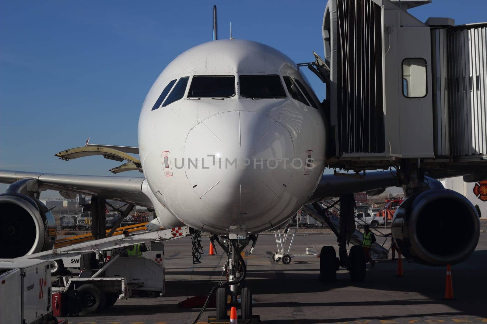 Airplane at the terminal gate ready for takeoff. Airline unknown.