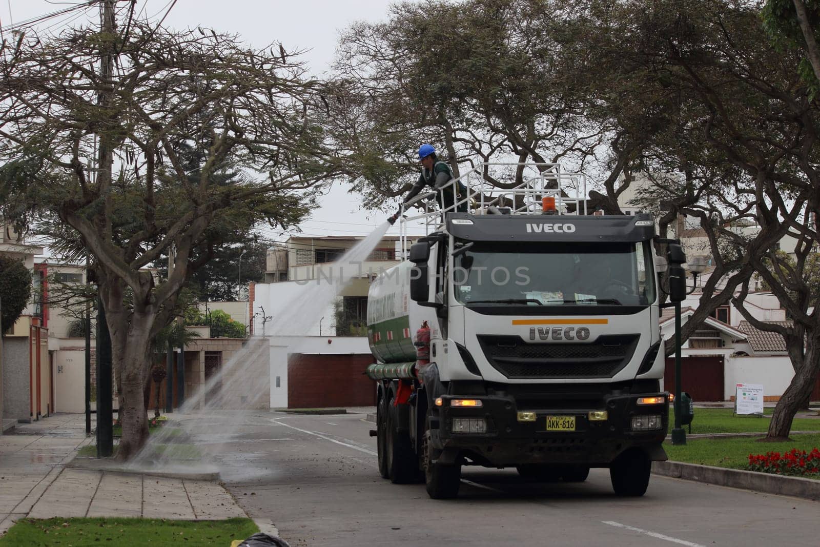 Water truck in the city park in Lima, Peru.