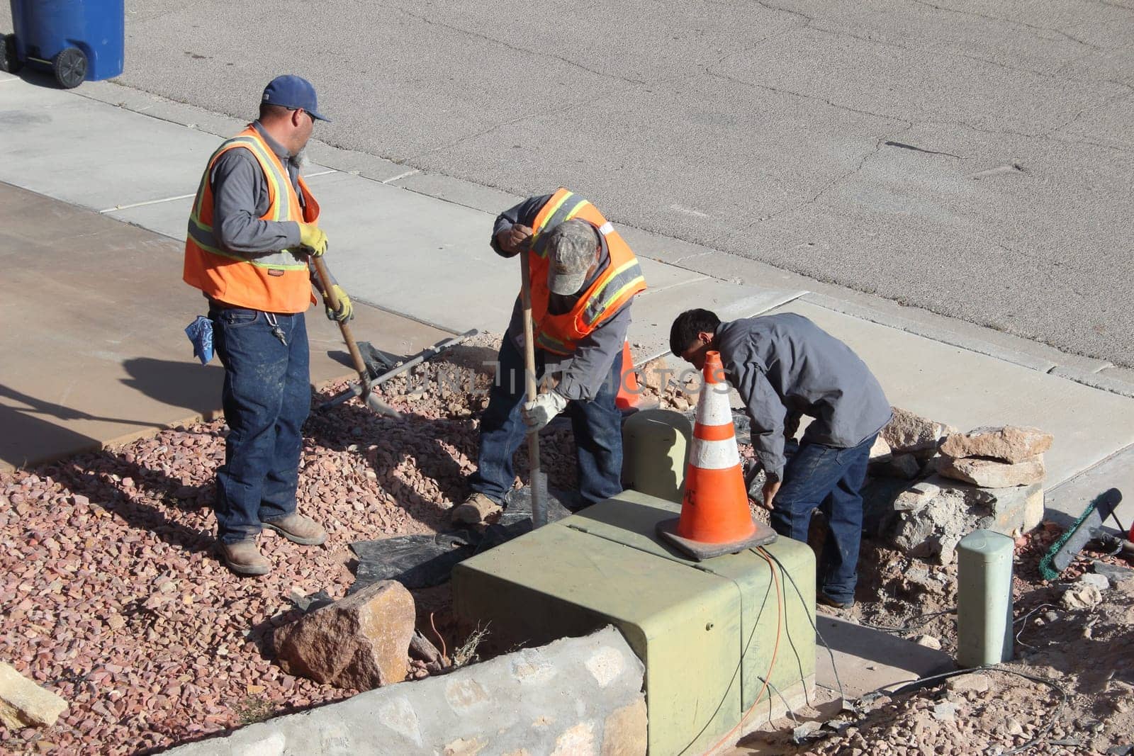 Workers on a road construction, industry and teamwork.