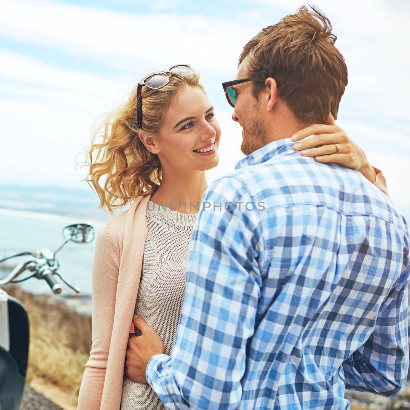 Quality time should be at the top of your list. a couple having a intimate moment while out on the road. by YuriArcurs