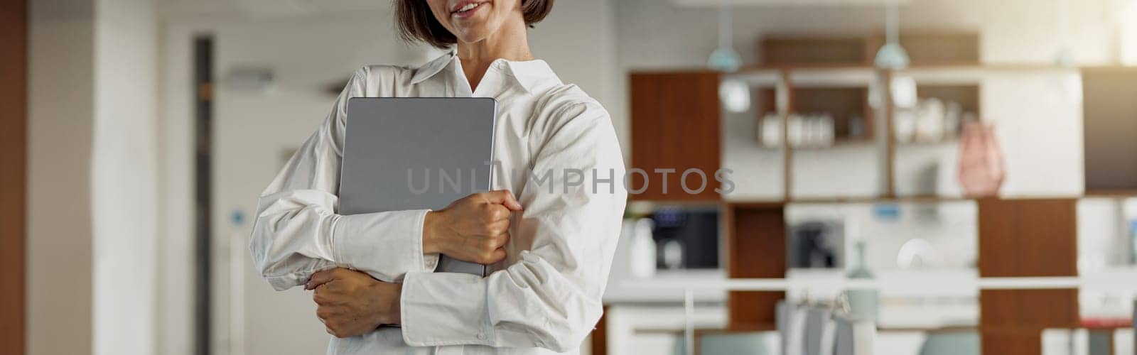 Attractive european business woman in casual clothe with laptop standing in modern office by Yaroslav_astakhov