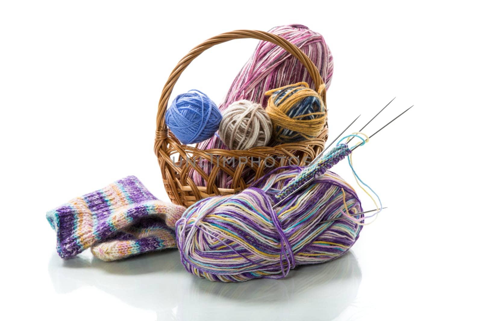 Colored threads, knitting needles and other items for hand knitting by Rawlik