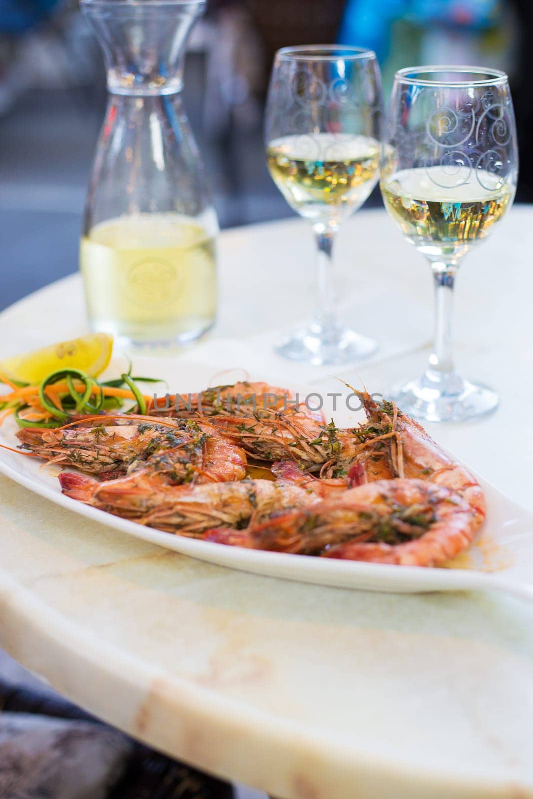 Beautiful and very tasty royal prawns in a restaurant. by sfinks