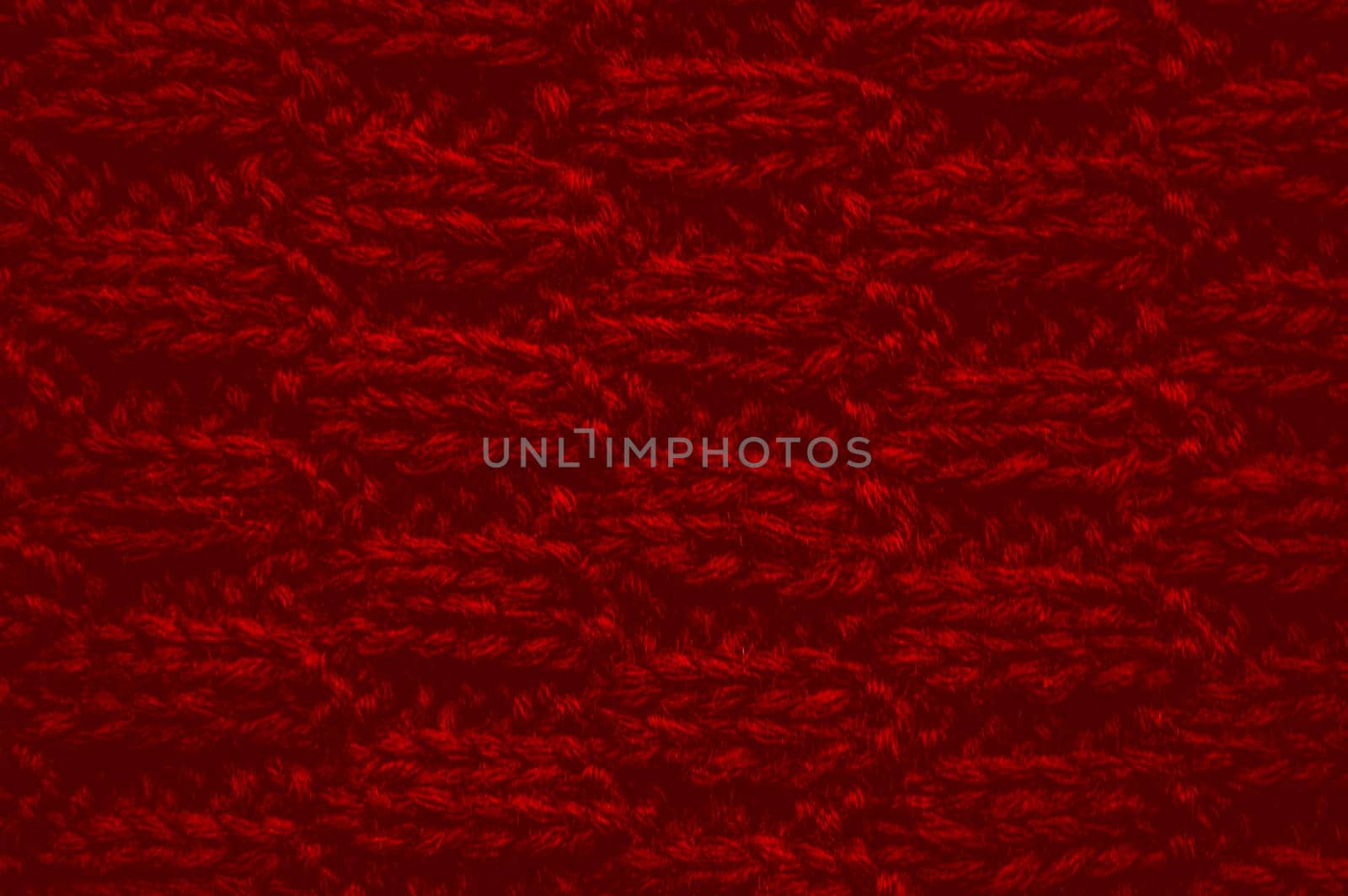 Macro Knitted Fabric. Organic Woven Sweater. Cotton Handmade Holiday Background. Abstract Wool. Red Fiber Thread. Scandinavian Xmas Print. Weave Jumper Wallpaper. Structure Knitted Wool.