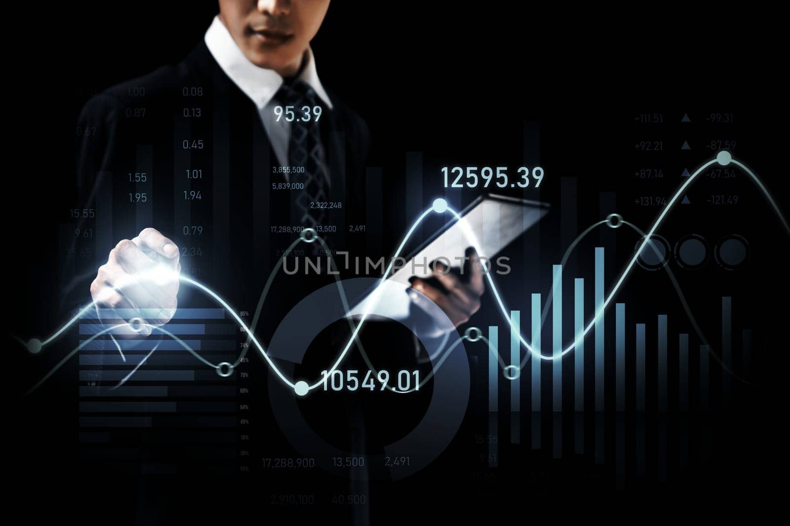 Businessman analyst working with digital finance business data graph showing technology of investment strategy for perceptive financial business decision. Digital economic analysis technology concept.