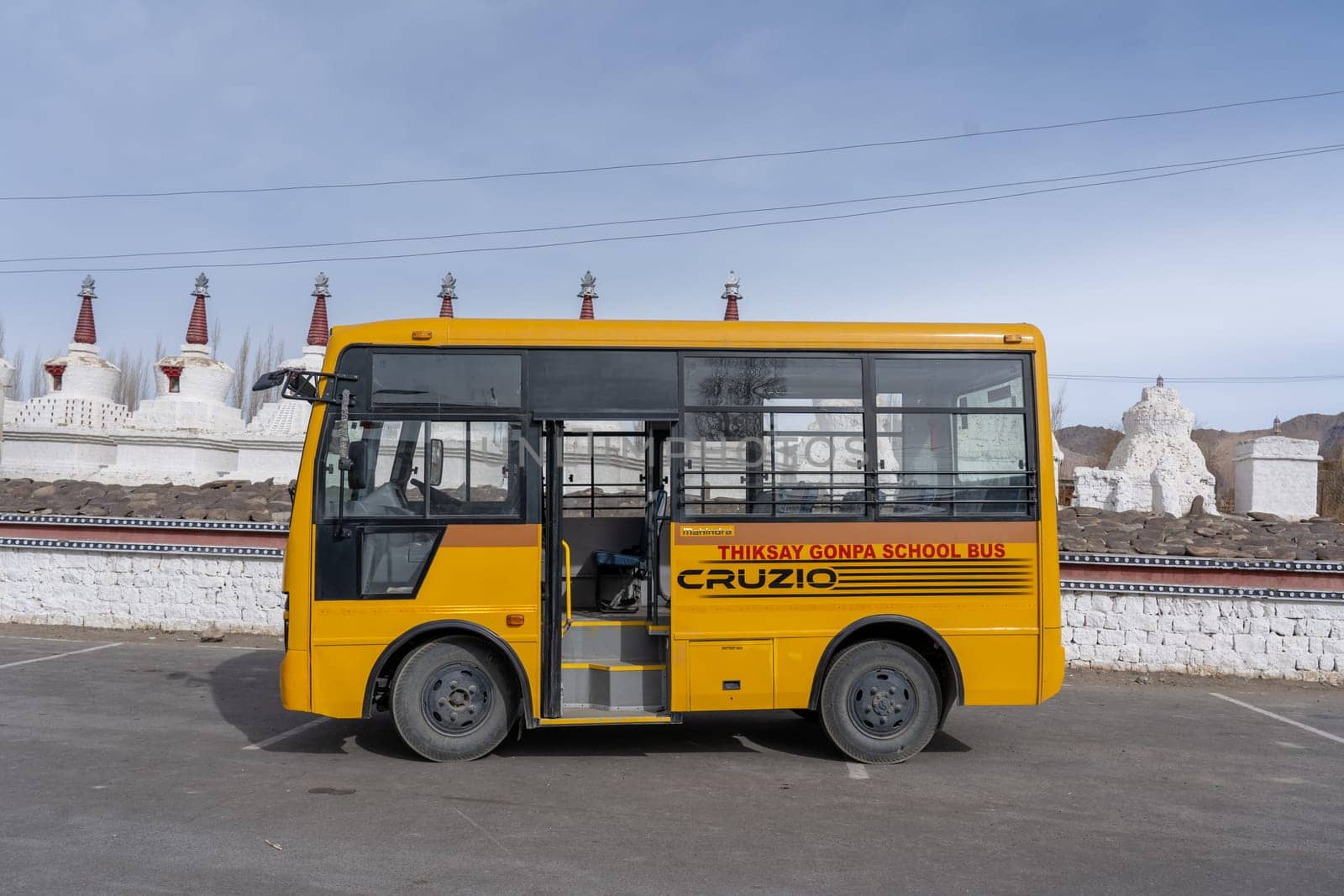 Yellow School Bus in Thiksey, India by oliverfoerstner