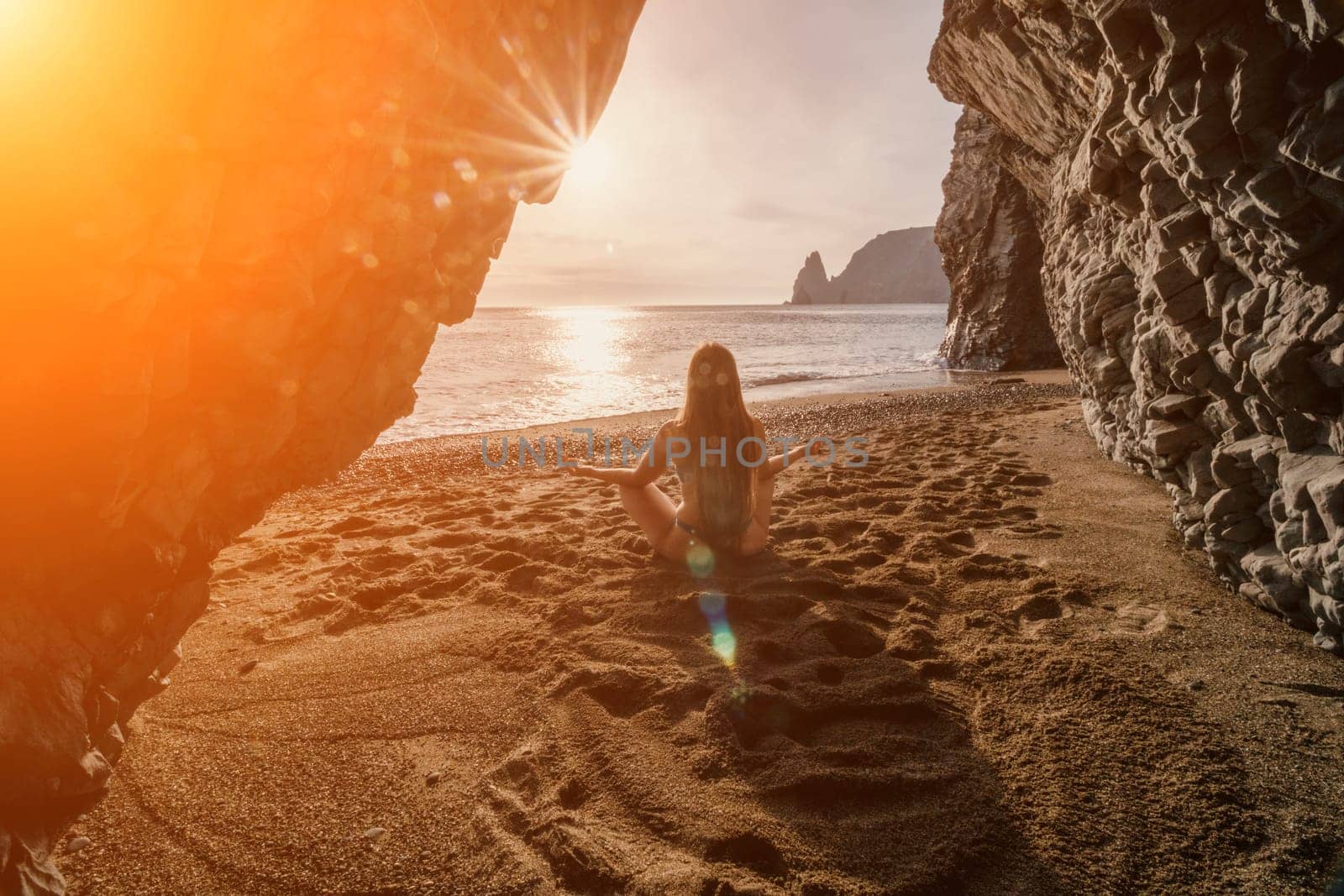 Woman sea pilates. Sporty happy middle aged woman practicing fitness on beach near sea, smiling active female training on yoga mat outside, enjoying healthy lifestyle, harmony and meditation. by panophotograph