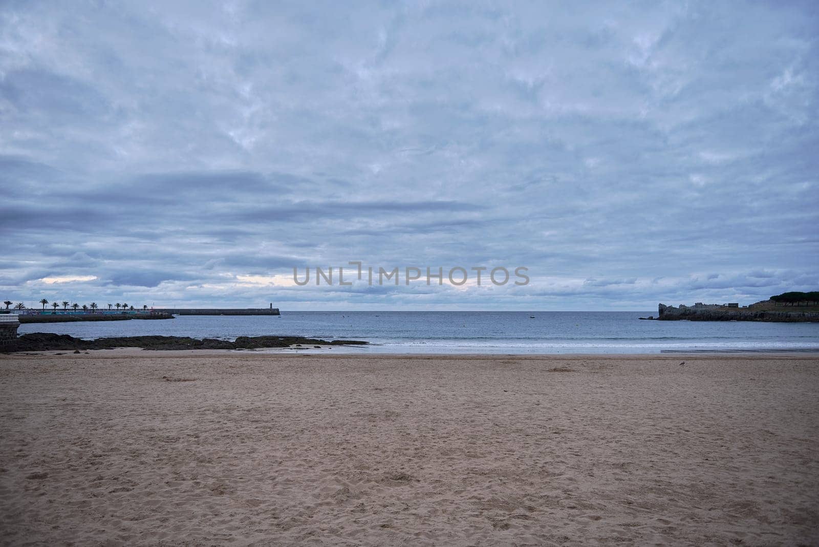 Beach of Castro Urdiales in Spain, cloudy day by raul_ruiz