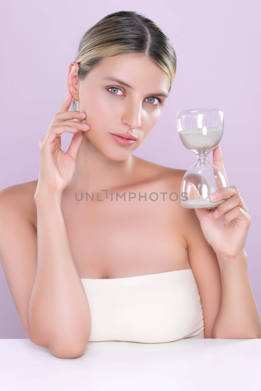 Alluring beautiful woman with hourglass anti-aging as skincare concept by biancoblue