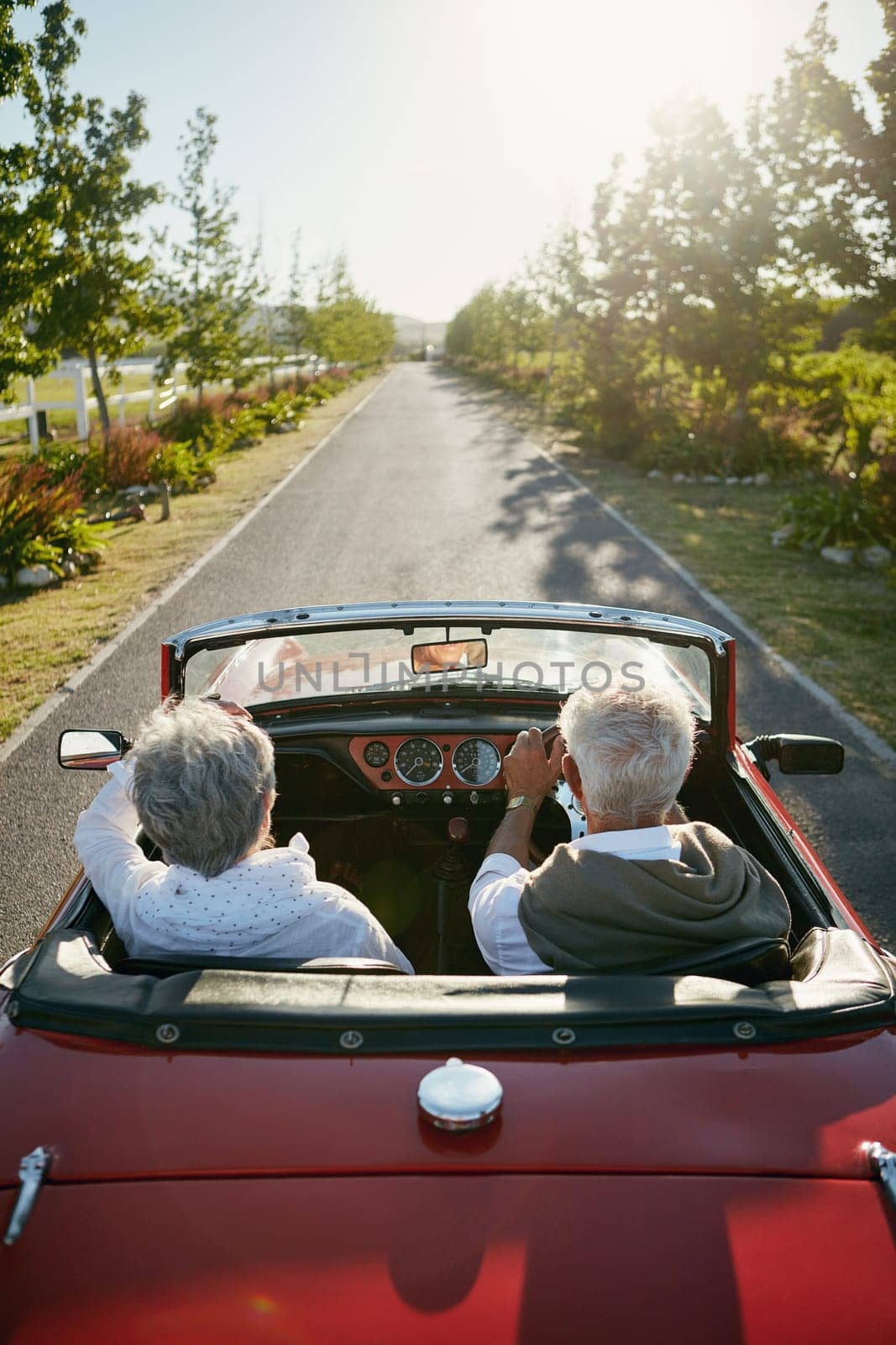 Taking a trip down memory lane. a senior couple going on a road trip