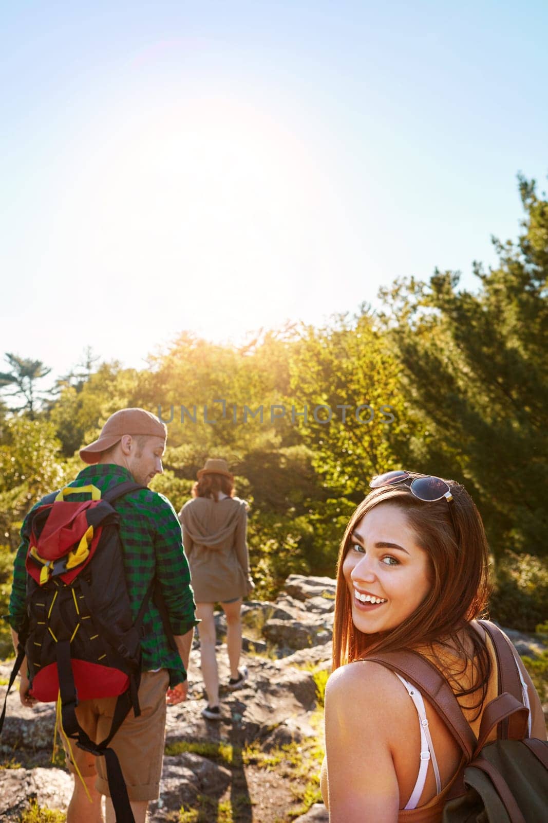 Life is incredible and exciting. three friends out hiking in the mountains