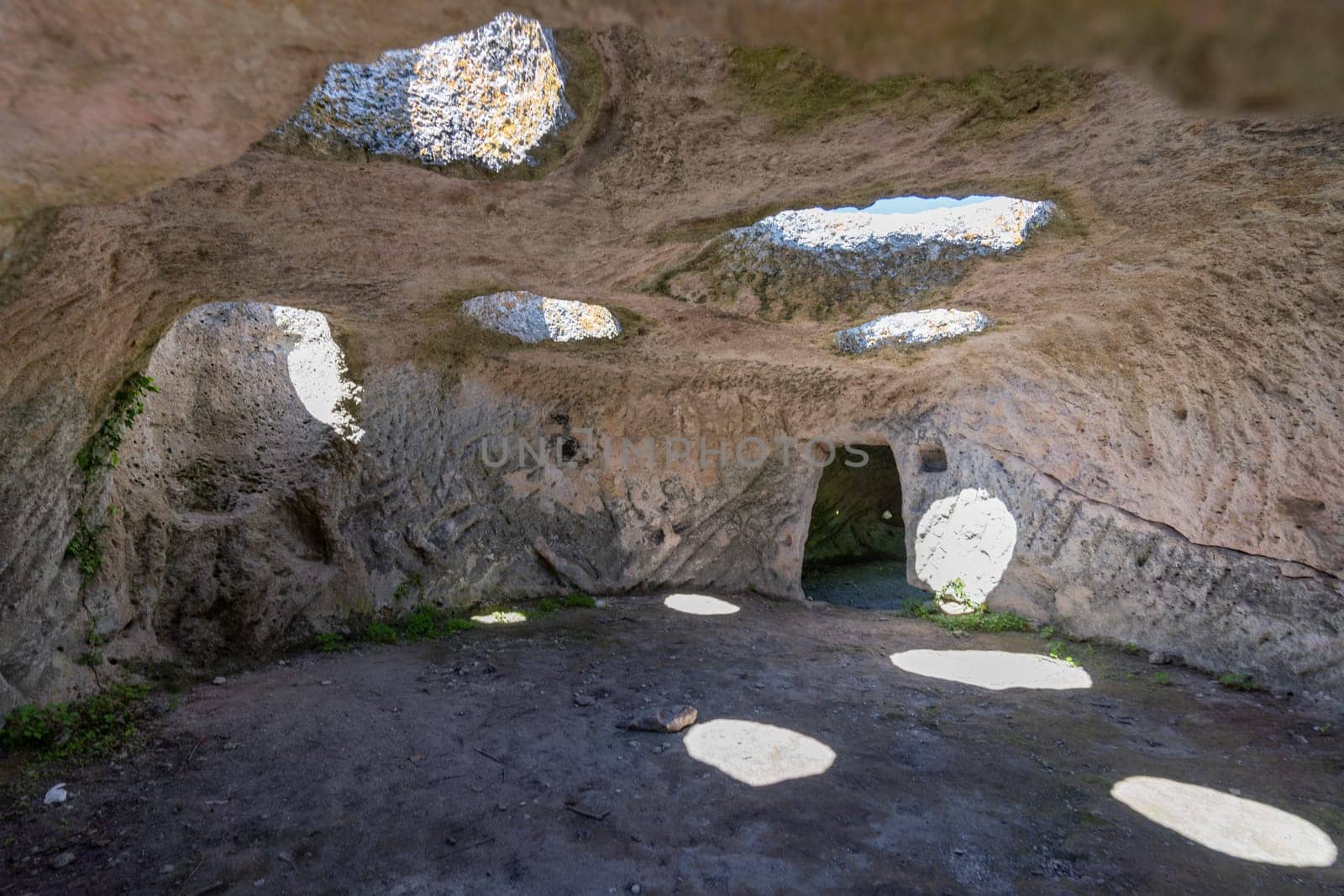 Ancient cave city. Inside the cave, view from the window