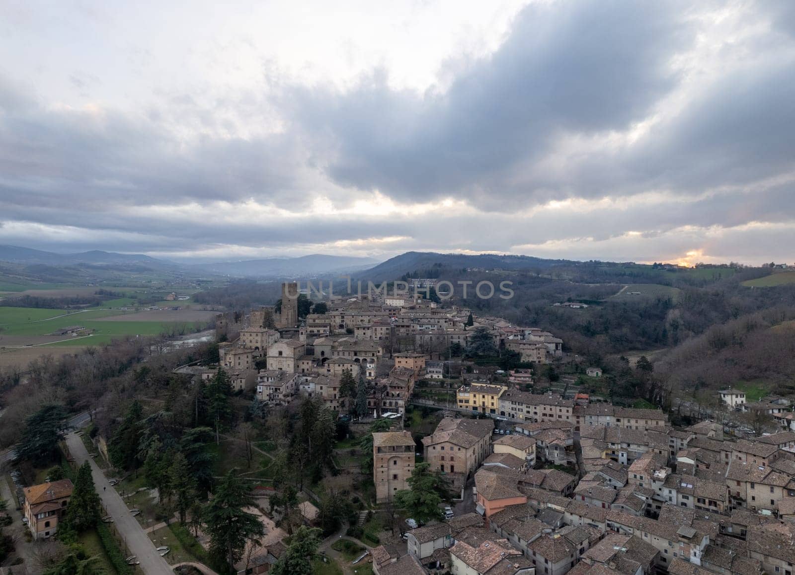 Aerial view of Castell'Arquato medieval village in Emilia Romagna, Italy at sunset