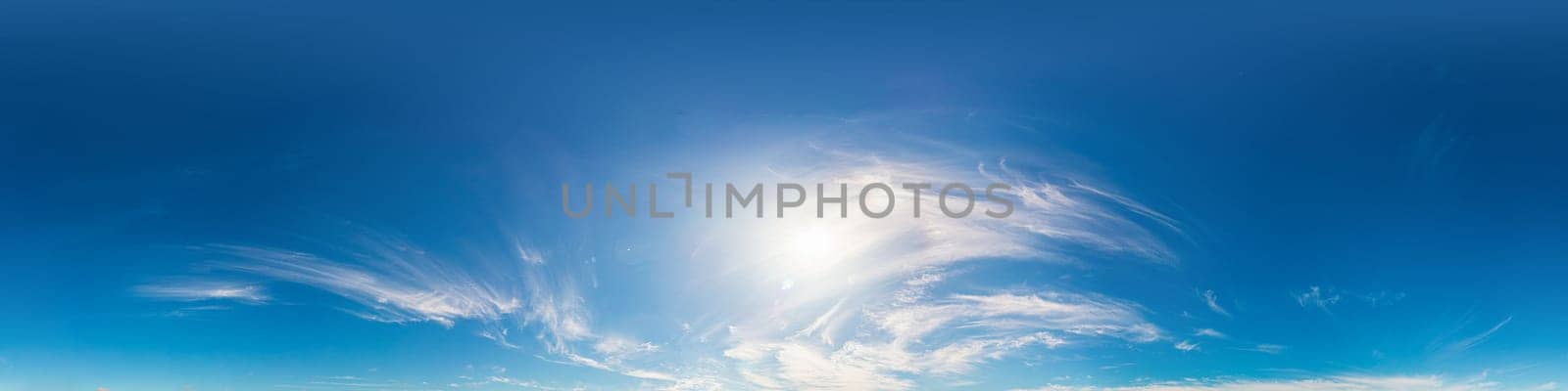 Bright sunset sky panorama with Cirrus clouds. Seamless hdr spherical equirectangular 360 panorama. Sky dome or zenith for 3D visualization, game and sky replacement for aerial drone 360 panoramas.