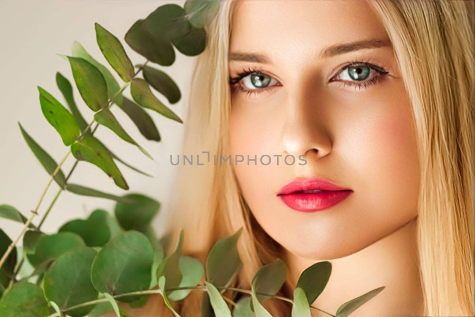 Beautiful woman and green leaves branch, blonde hair, red lipstick make-up face portrait, natural beauty and cosmetics by Anneleven