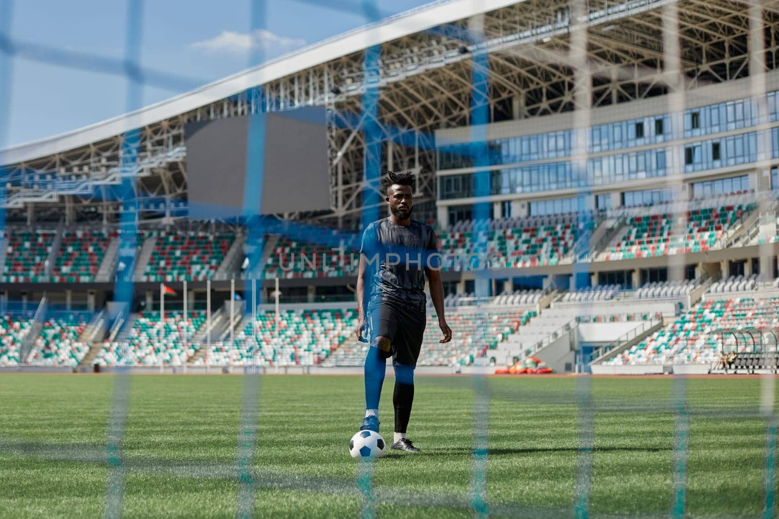Football, soccer goal net with green grass background
