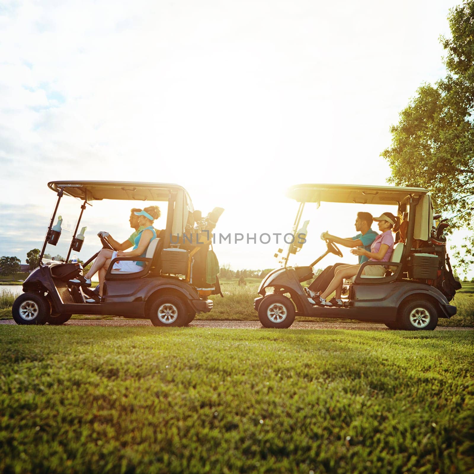 Coupled up on the golf course. a group of friends riding in a golf cart on a golf course