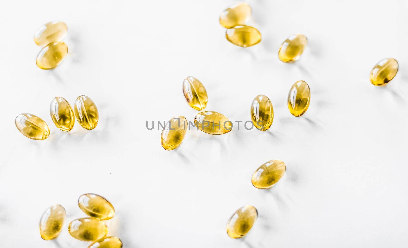 Pharmaceutical, branding and science concept - Vitamin D and golden Omega 3 pills for healthy diet nutrition, fish oil food supplement pill capsules, healthcare and medicine as pharmacy background