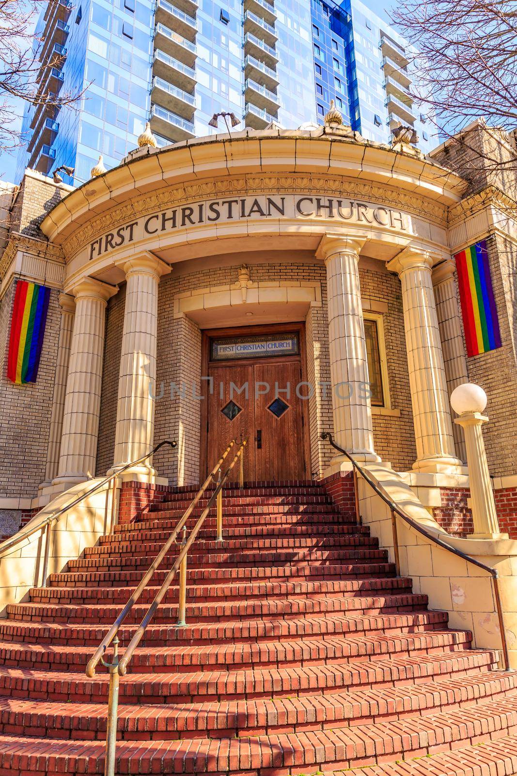 Portland, Oregon, USA - February 25, 2016: Established in 1879, First Christian Church of Portland shows its corner staircases leading to a column adorned entrance.