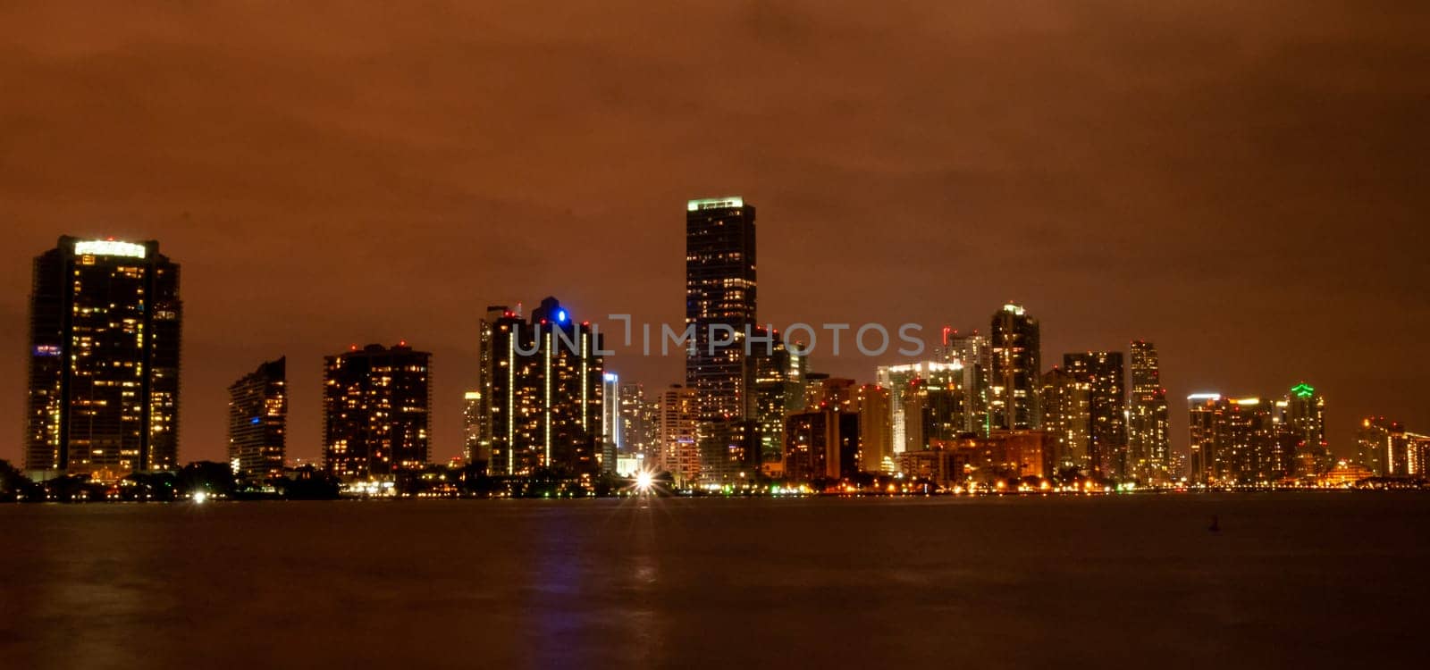 view of the night glowing city on the coast of the Gulf of Mexico, Florida by Hydrobiolog